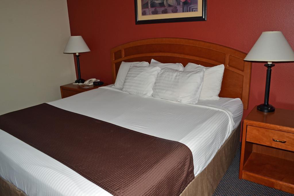 Paola Inn And Suites Rum bild